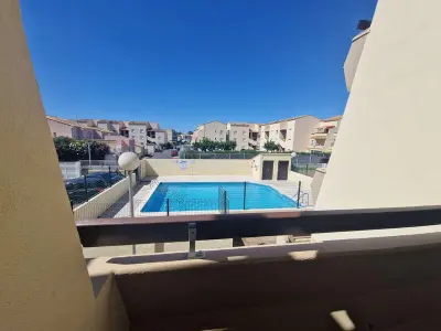 Appartement à Marseillan Plage, Appartement cosy 2 pièces avec cabine, terrasse et piscine, près de la plage à Marseillan - L883656