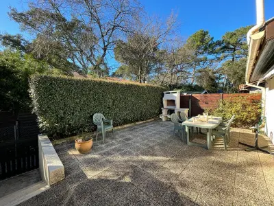 Villa in Capbreton,Villa patio proche plage avec piscine collective, cour aménagée et parking privé FR-1-413-139 N°831642