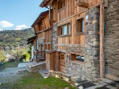 Chalet à Méribel, Chalet cosy au Raffort avec jardin, proche télécabines et bus, parking, animaux admis - L832007