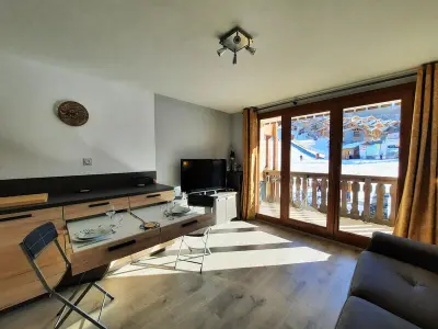 Appartement à Les Belleville, Appartement 2 pièces 4 pers au pied des pistes avec balcon exposé Sud-Est, parking, casier à skis - L885836