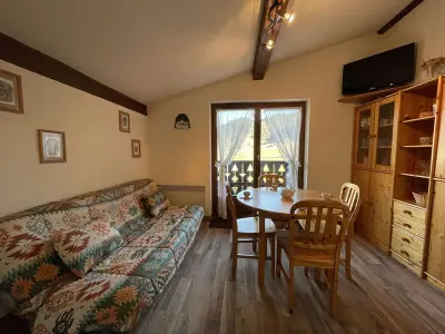 Appartement à Praz sur Arly, Appartement skis aux pieds avec balcon, parking et casier à ski à Praz-sur-Arly - L886066