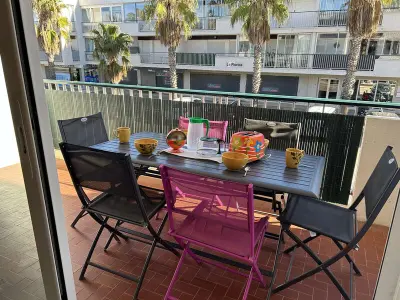 Appartement à Le Grau du Roi, Appartement familial proche plage avec parking, climatisation et balcons - 6 couchages - L886469
