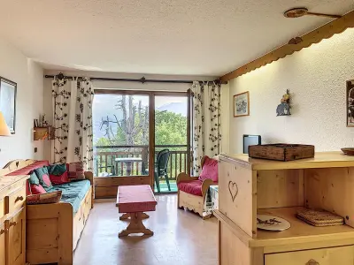 Appartement à Combloux, Studio confortable au centre de Combloux avec parking et accès ski bus - L887219