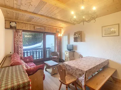 Appartement à Combloux, Studio cosy avec cabine, pied des pistes à Combloux, balcon, casier à skis, équipements modernes - L887236