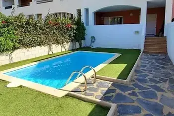 Apartamento en Vera Playa,Bajo con terraza jardín y piscina privada ES-04621-63 N°896563