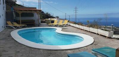 Casa vista al mar,piscina compartida,Wifi y jardin, Chalet 4 personnes à Guía de Isora 955194