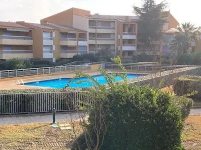 Appartement à Le Lavandou, Appartement Climatisé avec Terrasse et Piscine au Lavandou - L901789