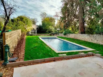 Gîte in Bazouges sur le Loir,Maison familiale près du Zoo de la Flèche avec piscine chauffée, jardin et cheminée FR-1-410-377 N°859446