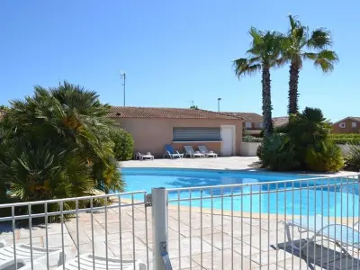 Appartement à Vendres, Pavillon 4 pers avec piscine, terrasse, parking, à 700m de la plage et proche commerces - L903518