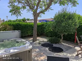 Wohnung in Cap d'Agde naturisme,Appartement Climatisé, Jardin et Jacuzzi, 2 Chambres, Garage Électrique, Proche Plage FR-1-606-210 N°860404