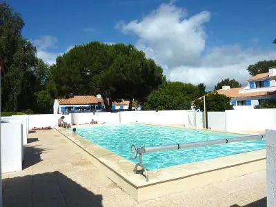 Maison à Saint Jean de Monts, Maisonnette studio mezzanine avec piscine chauffée, proche plage et commerces - St Jean de Monts - L860580