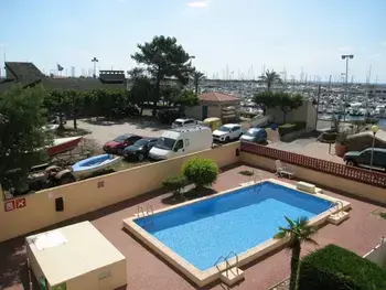 Appartement à Saint Cyprien, T2 Port St Cyprien Piscine, Clim, Parking, Animaux Ok - L905844