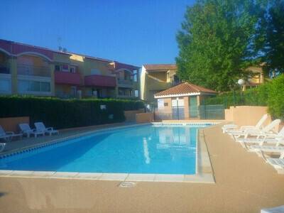 Dans résidence avec piscine, terrains de pétanque et de tennis, Appartement 5 personnes à Marseillan Plage FR-1-387-121
