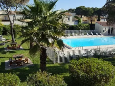 Appartement à Cap d'Agde, Appartement en Rez-de-Jardin: Piscine, Calme, Pinède, Parking, Terrasse, Proche Plage, BBQ - L908874