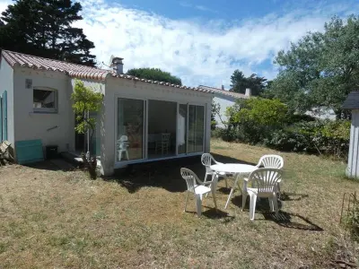 Maison à Notre Dame de Monts, Maison 5 pers à Notre-Dame-de-Monts, à 150m des plages, avec jardin et parking - L945763