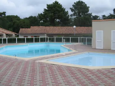 Maison à Les Mathes, Maison avec Piscine et Activités, Proche La Palmyre - 4 Pers. - L953143