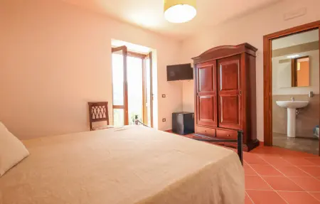 Location Maison 8 personnes à Rutino - Photo 25