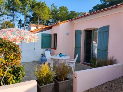 Maison à Saint Jean de Monts, Maison Confortable avec 2 Piscines, Proche Plage, Forêt et Pistes Cyclables à Saint-Jean-de-Monts - L981327