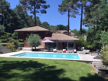 Location Villa à Biscarrosse, 250 Aquitaine - Spacieuse villa en bois au golf avec piscine chauffée 896521 N°987696