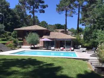 Villa en Biscarrosse, 250 Aquitaine - Spacieuse villa en bois au golf avec piscine chauffée 896521 N°987696