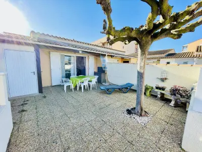 Appartement à Cap d'Agde, Villa Cap d'Agde : Plage à pied, piscine, parking, terrasse - L994902