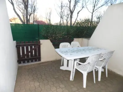 Appartement à Marseillan Plage, Studio RDC 4 couchages avec terrasse à Marseillan, proche plage, parking privé - L997200