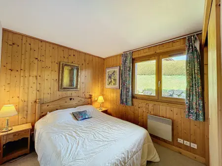 Appartement Mont Blanc : 2 chambres, terrasse, parking et équipements modernes - Photo 8