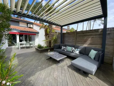 Villa à Capbreton, Patio rénovée 6 pers: BBQ, terrasse & clim, quartier calme boisé, proche plage - L999897