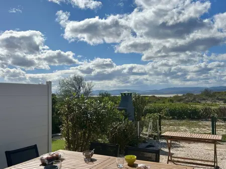 Maison à Le Barcarès, Maison de vacances charmante avec piscine, proche plages, clim, vélos et parking à Le Barcarès - L1000009