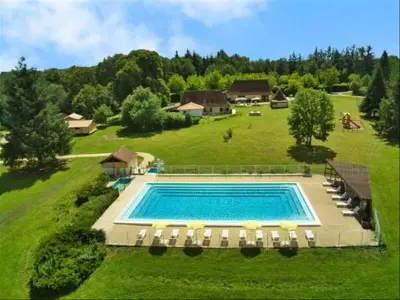 Haus in La Douze,Camping Ushuaïa Villages Le Domaine Du Bois Coquet - Maisonnette 5 Pers - TV - SANS SANITAIRE 911270 N°1001152