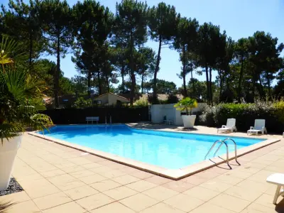 Maison à La Palmyre, Location Vacances La Palmyre - Maison 4/5 pers. avec Piscine, Proche Plages & Commerces. - L1001570