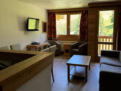 Appartement à Belle Plagne, Appartement cosy avec accès direct aux pistes, espace bien-être et piscine chauffée - N°1002309