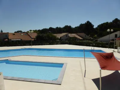 Maison à La Palmyre, Maison aux Mathes : Piscine, Tennis, Proche Plage et Commerces - L1002404