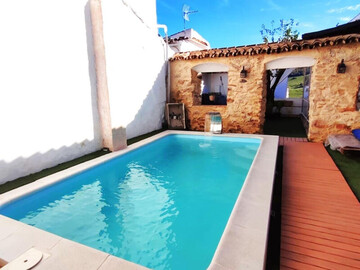 Location Gite à El Colmenar,Maison La Pintoresca à Benarrabá avec piscine partagée, 4 chambres, pour 12 personnes ES-282-13 N°1003280