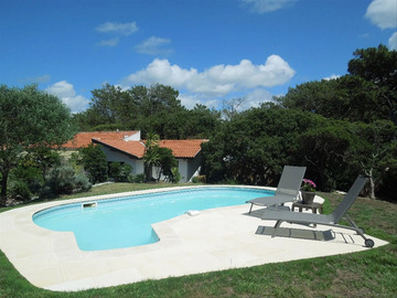 Location Villa à Seignosse,Villa OSTALAGNOTS Villa du Penon avec piscine  et beau jardin, la plage et les commerces à pied. Wifi gratuit. 540688 N°745469