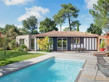 Villa en Capbreton,Villa avec piscine chauffée, jardin exotique, au calme proche plages et commerces, Capbreton FR-1-791-17 N°1005160