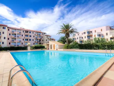 Appartement à Saint Cyprien, Studio Alcôve en Front de Mer avec Piscine, Terrasse et Parking à Saint Cyprien - L1007796