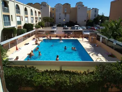 Appartement à Gruissan, **Gruissan : T2 cosy avec piscine, parking privé, proche plage et commerces** - L1007888