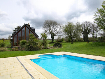 Location Gite in Saint Michel de Montjoie,Maison typique avec piscine chauffée et court de tennis, cadre verdoyant près du Mont St-Michel FR-1-362-1106 N°1009756