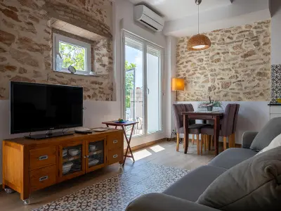 Appartement à Torredembarra, Appartement cosy avec jardin, BBQ, A/C, wifi, parking, à 600m de la plage - L1009940