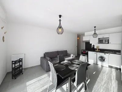 Appartement à Cabourg, Charmant appartement proche plage avec balcon et parking privé - L1016422
