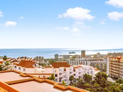 Apartamento en Los Cristianos,Penthouse luxueux avec grande terrasse, piscine chauffée et parking à Los Cristianos ES-347-4 N°1018985