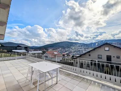 Appartement à Gérardmer, Charmant appartement avec terrasse, parking et WiFi à Gérardmer - L1026264