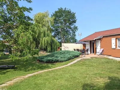 Gite à Pesmes, Chalet au cœur de la nature avec terrasse, clim, parking privatif FR-1-583-350 N°1030565