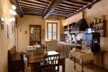 Maison à Montalcino, Maison charmante à Montalcino avec vue sur la ville - L1064141