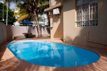 Appartement à Trou aux Biches, Bel appartement avec piscine à Trou-aux-Biches 80 m² - L1065618