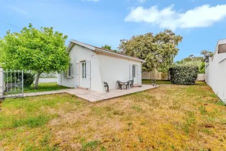 Maison à Soulac sur Mer, Maison charmante à Soulac-sur-Mer avec jardin clôturé - L1065840