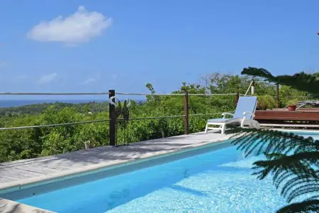 Villa à Sainte Anne, Villa moderne avec piscine à Sainte-Anne 154 m² vue mer - L1069291