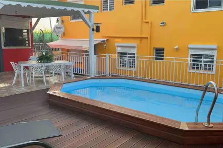 Appartement à Les Abymes, Appartement charmant à Les Abymes avec piscine privée, 60m² - L1069891