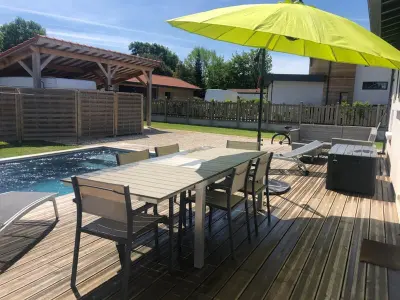 Maison à Gujan Mestras, Maison famille avec piscine, Wi-Fi et parking à Gujan-Mestras - L1071481